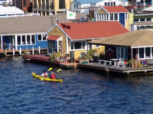 Kayakers amongst the houseboats